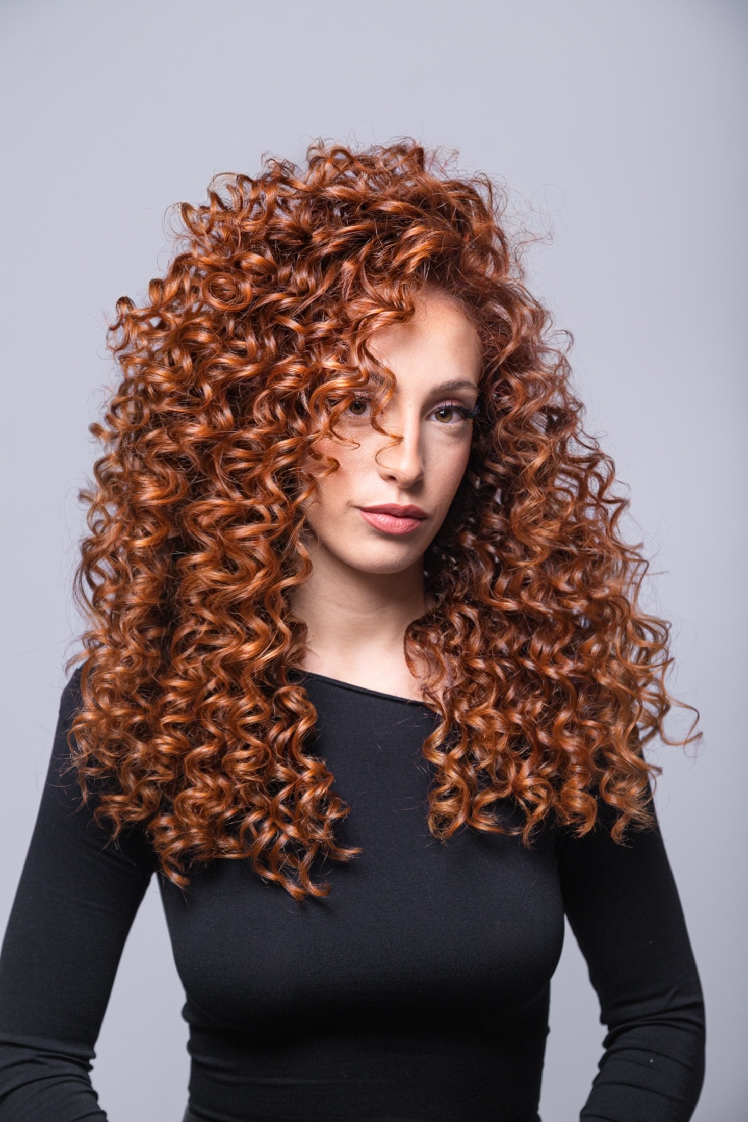 Imagen representativa de Definición Profesional de Rizos (Método Curly NELA)